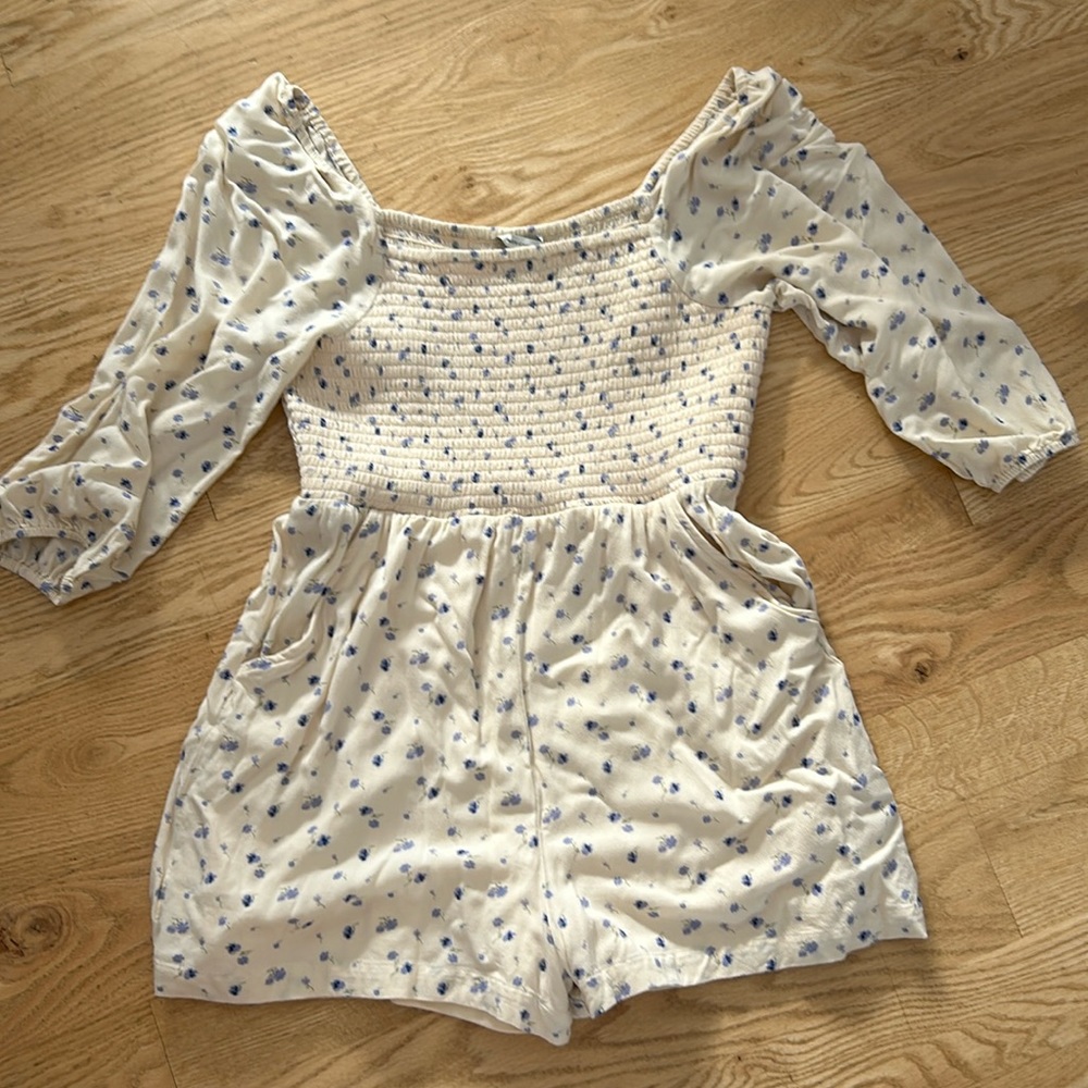 Cream romper with blue floral design